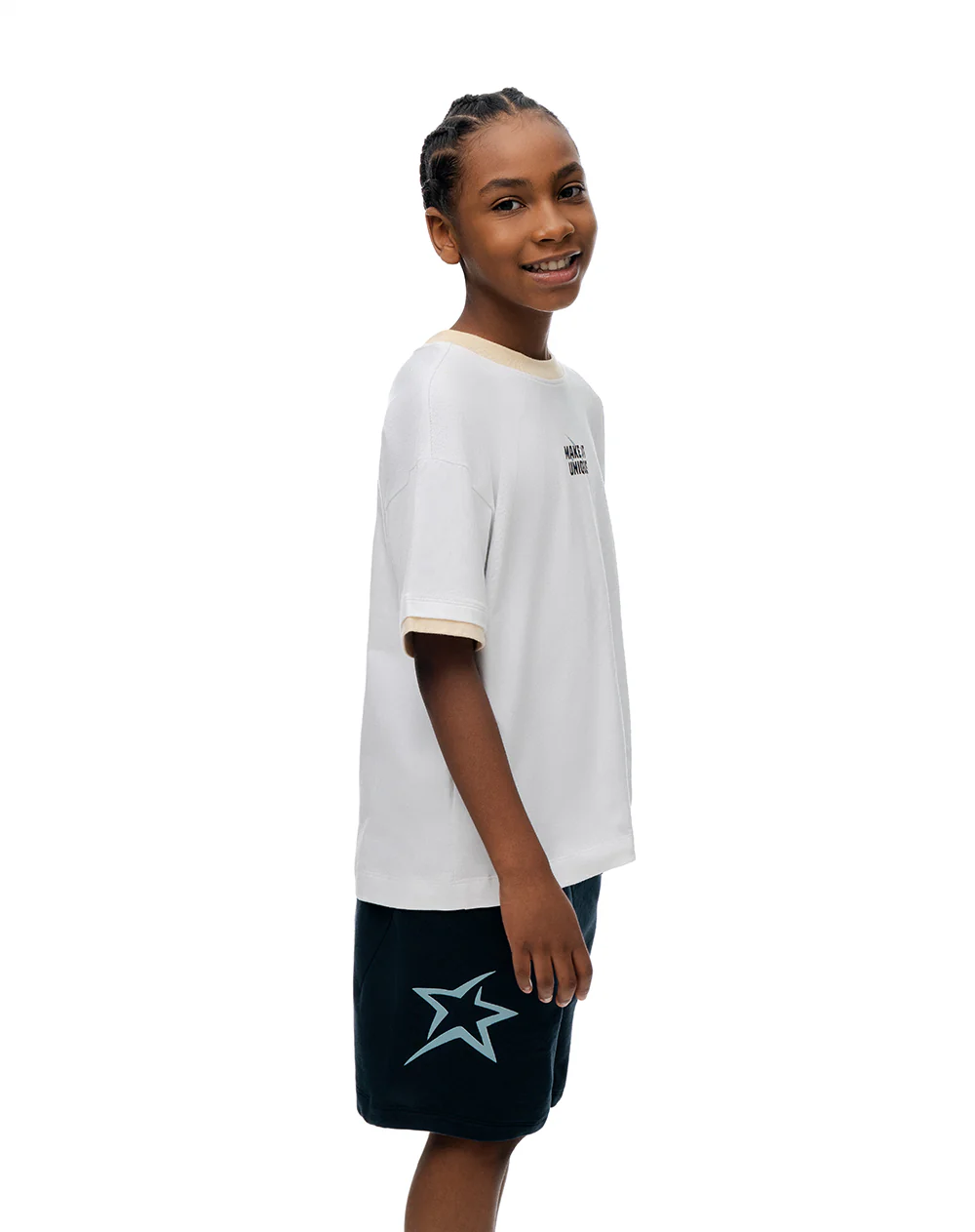 Conjunto camiseta + bermuda surtido niño - Image 6
