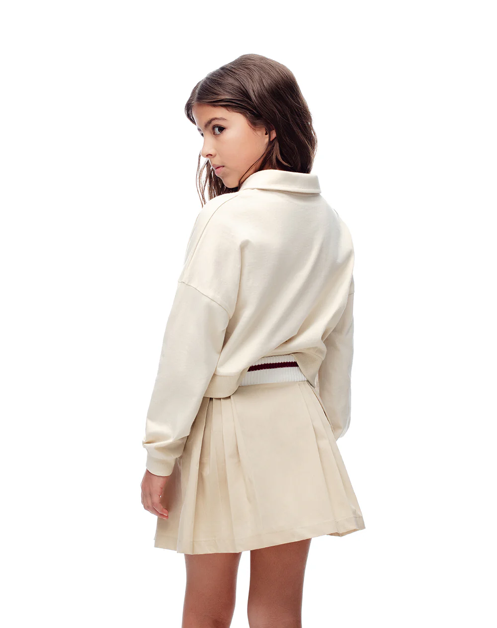 Falda corta con pliegues beige niña - Image 2
