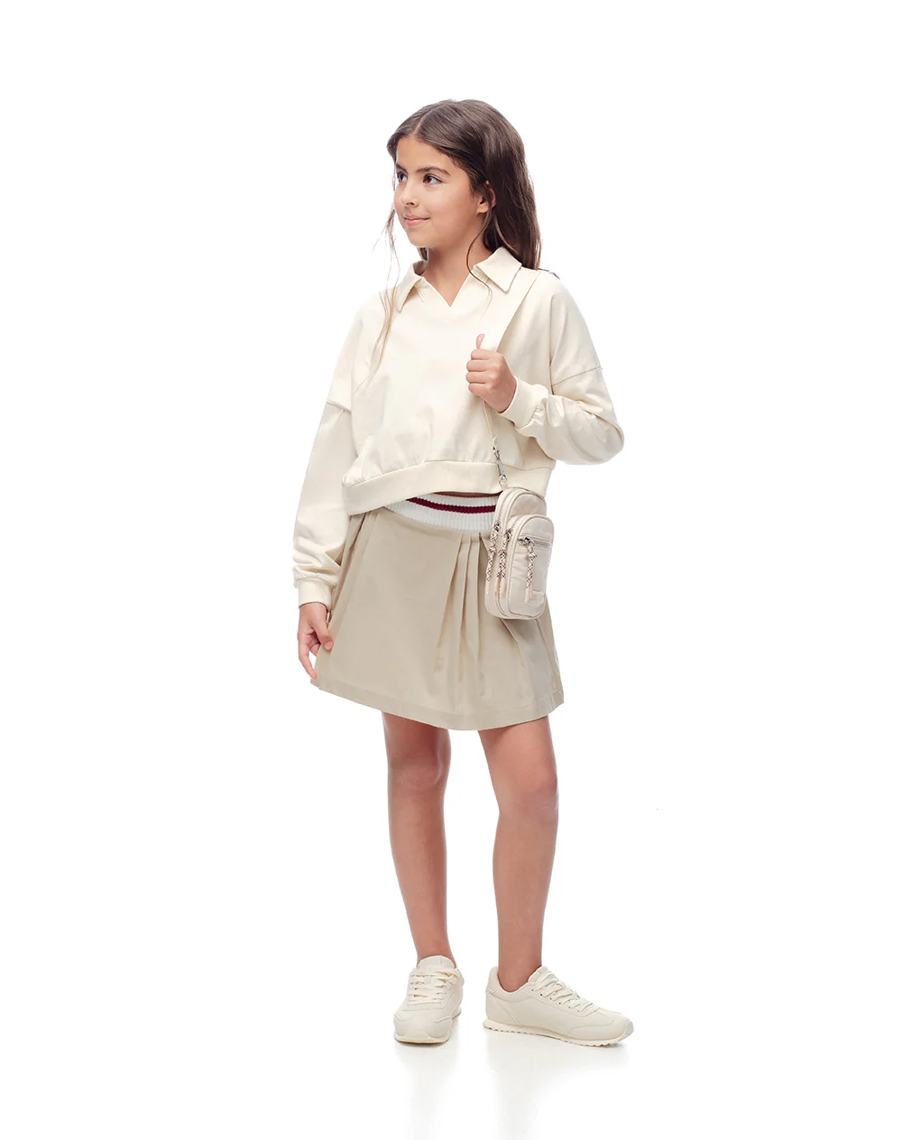 Falda corta con pliegues beige niña - Image 4